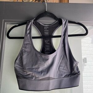 Worn once pink sports bra- large